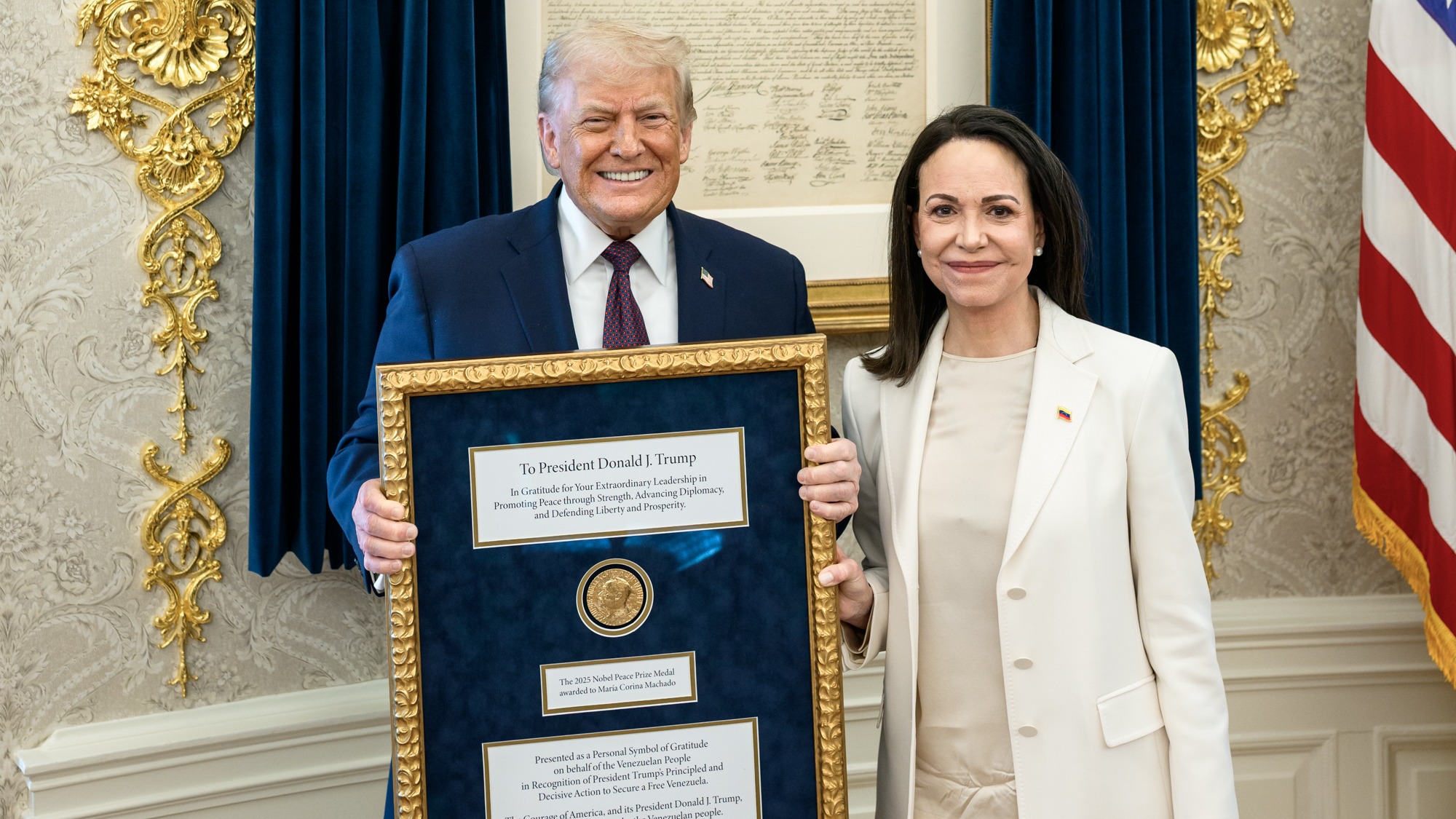 Venezuela's Machado presents her Nobel Peace Prize medal to Trump