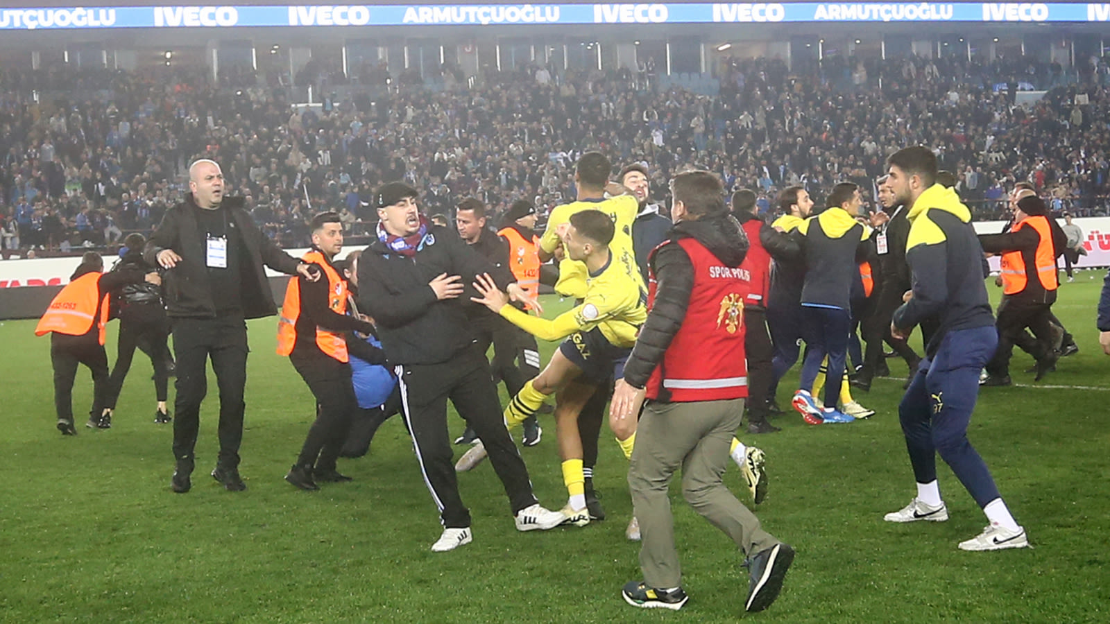 Violence erupts in Turkey after football fans storm pitch and attack ...