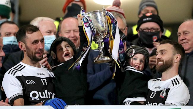Aidan Branagan and Conor Laverty lift the cup