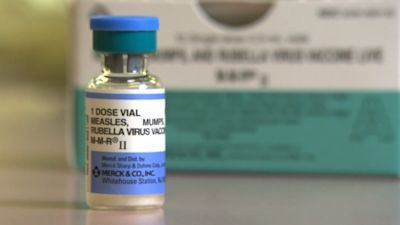 A small vial containing the MMR vaccine