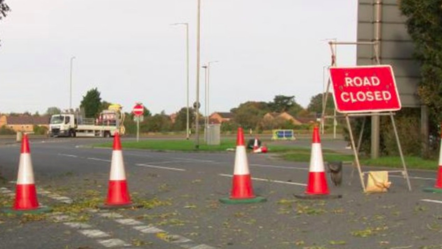 Two people charged after fatal A1
