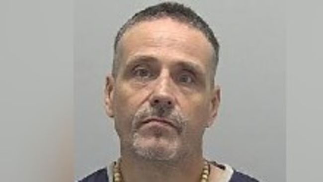 Shoplifter Neil Stimson, 48, arrested at prison gates
Credit: Bedfordshire Police