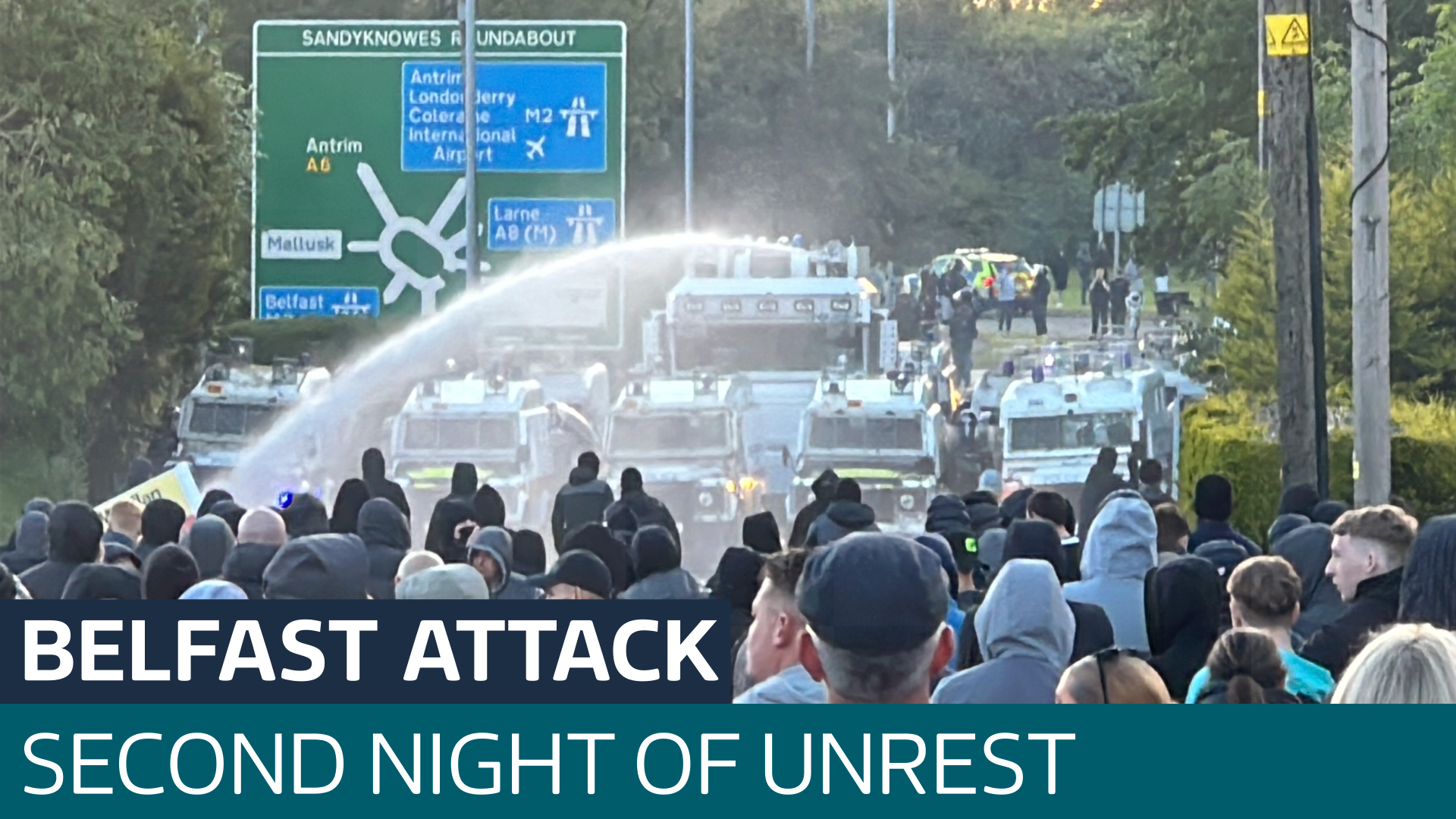 Belfast unrest: Police use water cannon on crowds