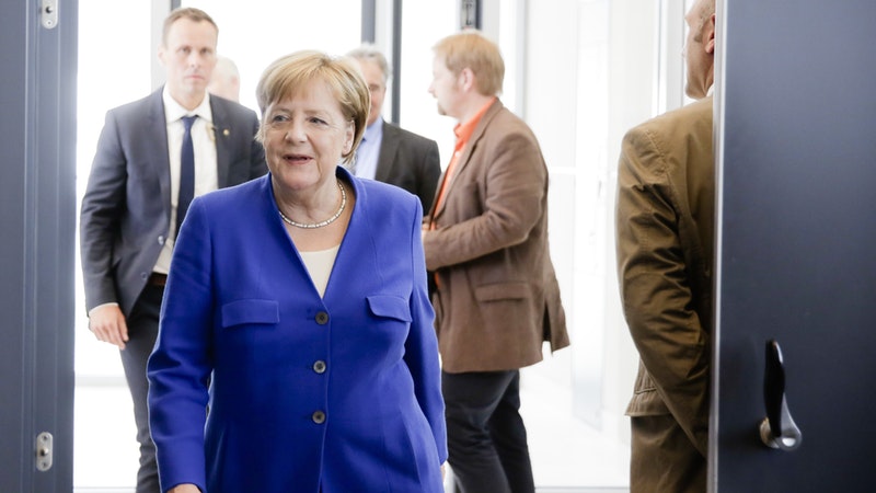 Angela Merkel Reaches Compromise To End Immigration Row Threatening ...