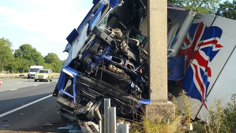 Motorists face long delays after lorry crashes into bridge over M6 ...