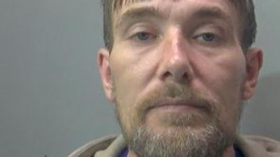 Andrew Allen threatened a shop worker with two large knives