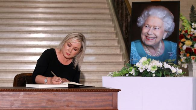 Michelle O'Neill signs book of condolence at Stormont. Pic Presseye