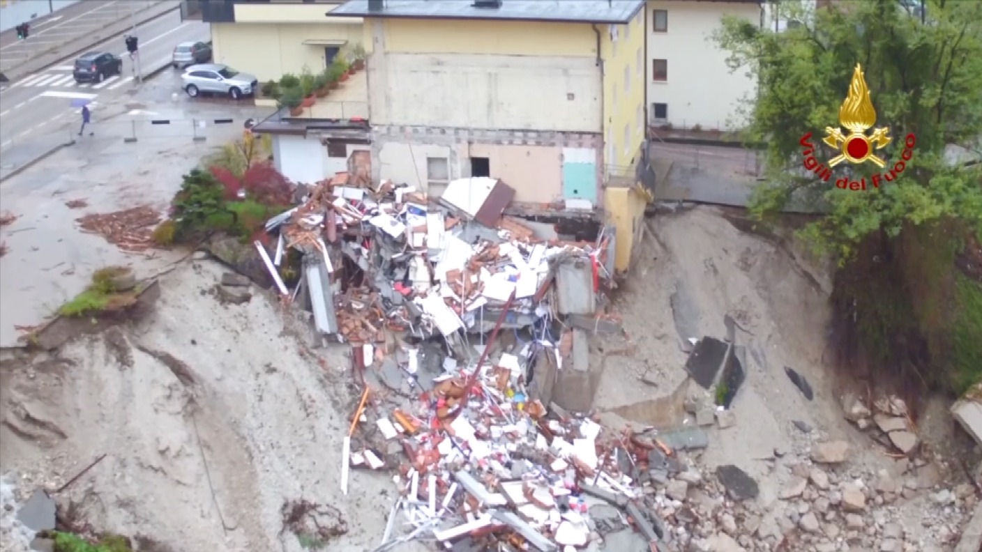 Storm-damaged Italy captured in drone footage as logs clog lake amid ...