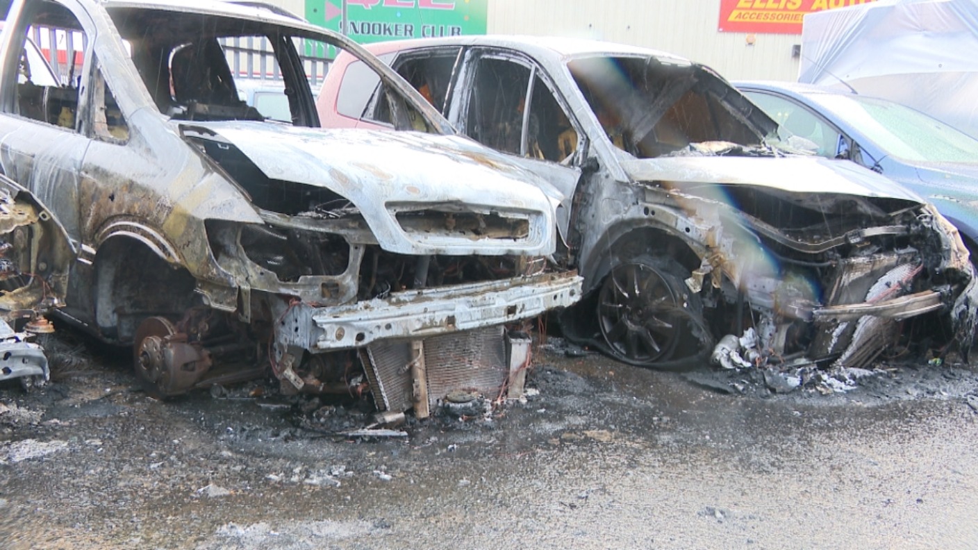 Carrick business owner blames UDA for torched cars | UTV | ITV News