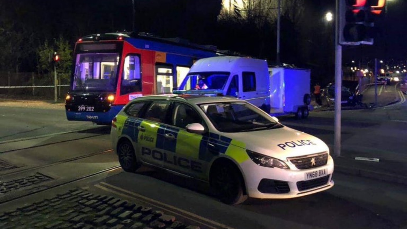 Three people taken to hospital after crash between car and tram in ...