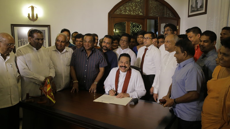 Sri Lanka’s Disputed Prime Minister Resigns - With A Smile - To End ...