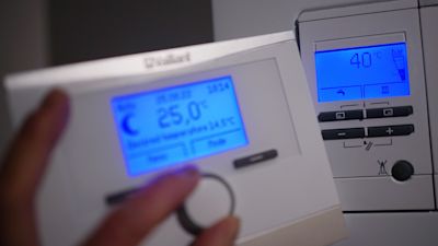 A domestic home thermostat.