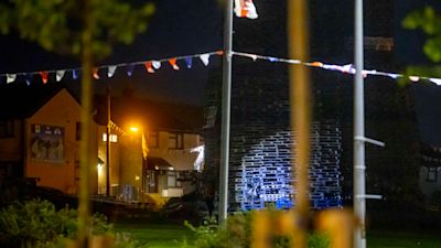 Police remain at the scene of the incident in Larne.