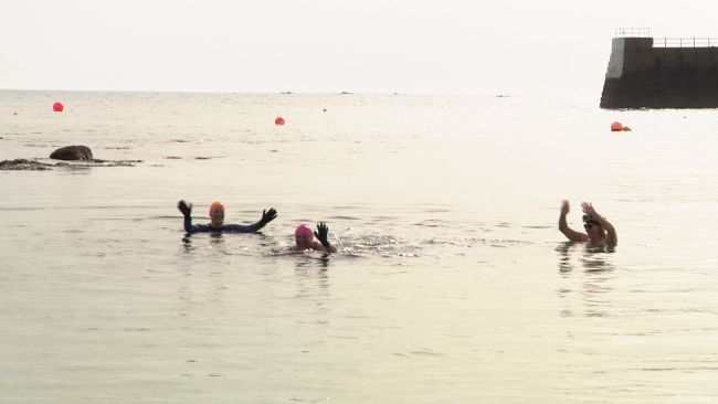 Jersey woman completes a swim in all 12 parishes in a day to raise money for MIND