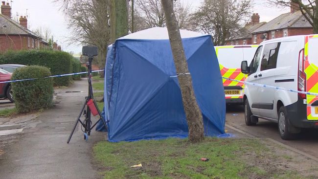 Two men have been charged with murder after a man was found stabbed to death in a back garden in Banbury.