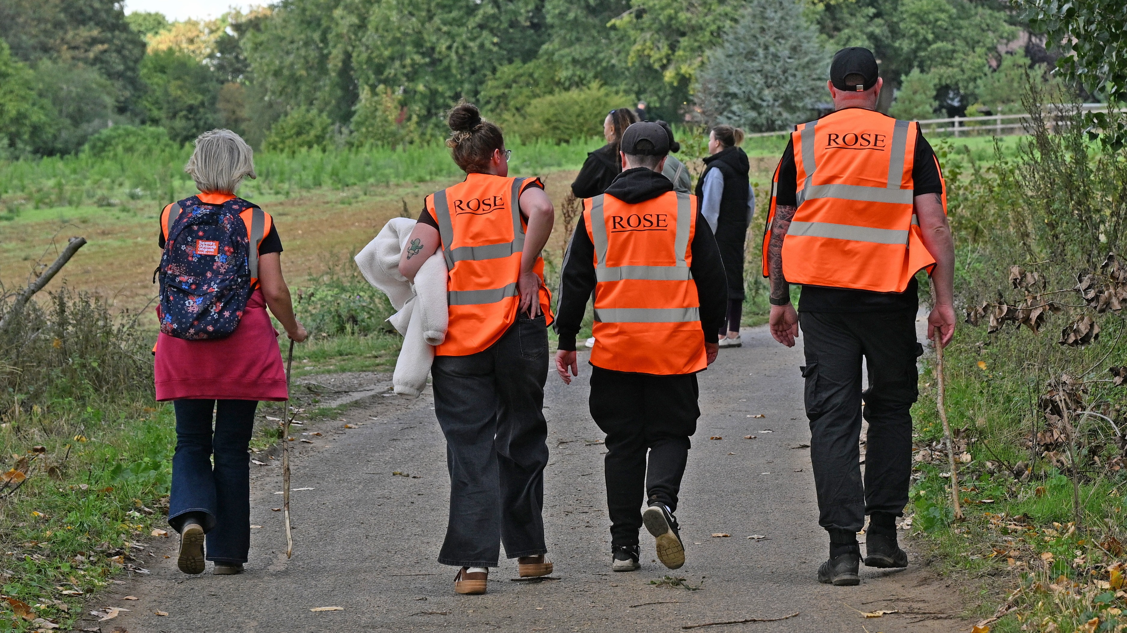 Volunteers gathering in a field during the search for a missing three-year-old in Suffolk.