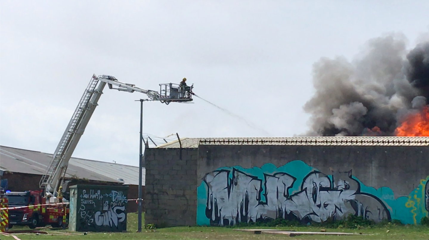 Firefighters tackle large fire at scrap yard in Sunderland | ITV News