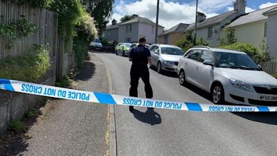 police cordon off street on collapark