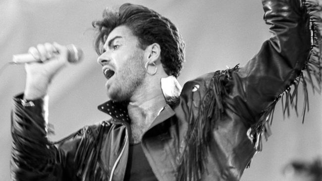 George Michael on stage at Wembley Stadium for the Wham! sell-out farewell concert.
