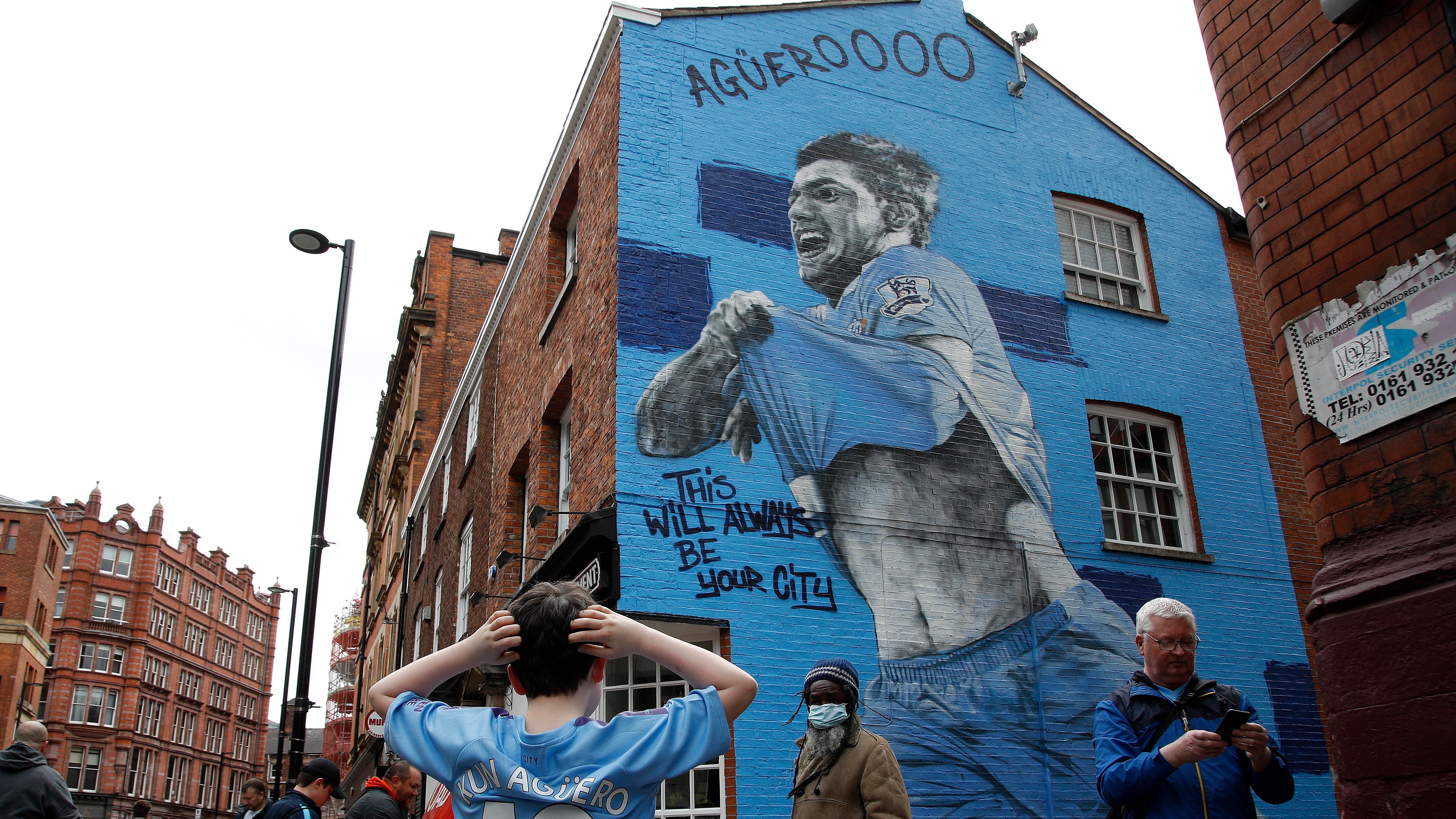 Vandals spray paint 'MUFC' on mural of Manchester City boss Pep Guardiola  near Etihad | ITV News Granada