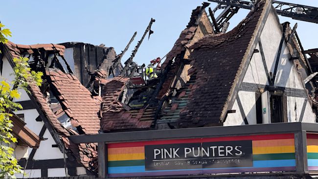 Fire officers damp down hotspots after a devastating fire at the LGBT+ nightclub venue in Milton Keynes. Credit: ITV News Anglia