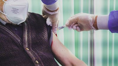 Over 80 person getting vaccine. PA Images