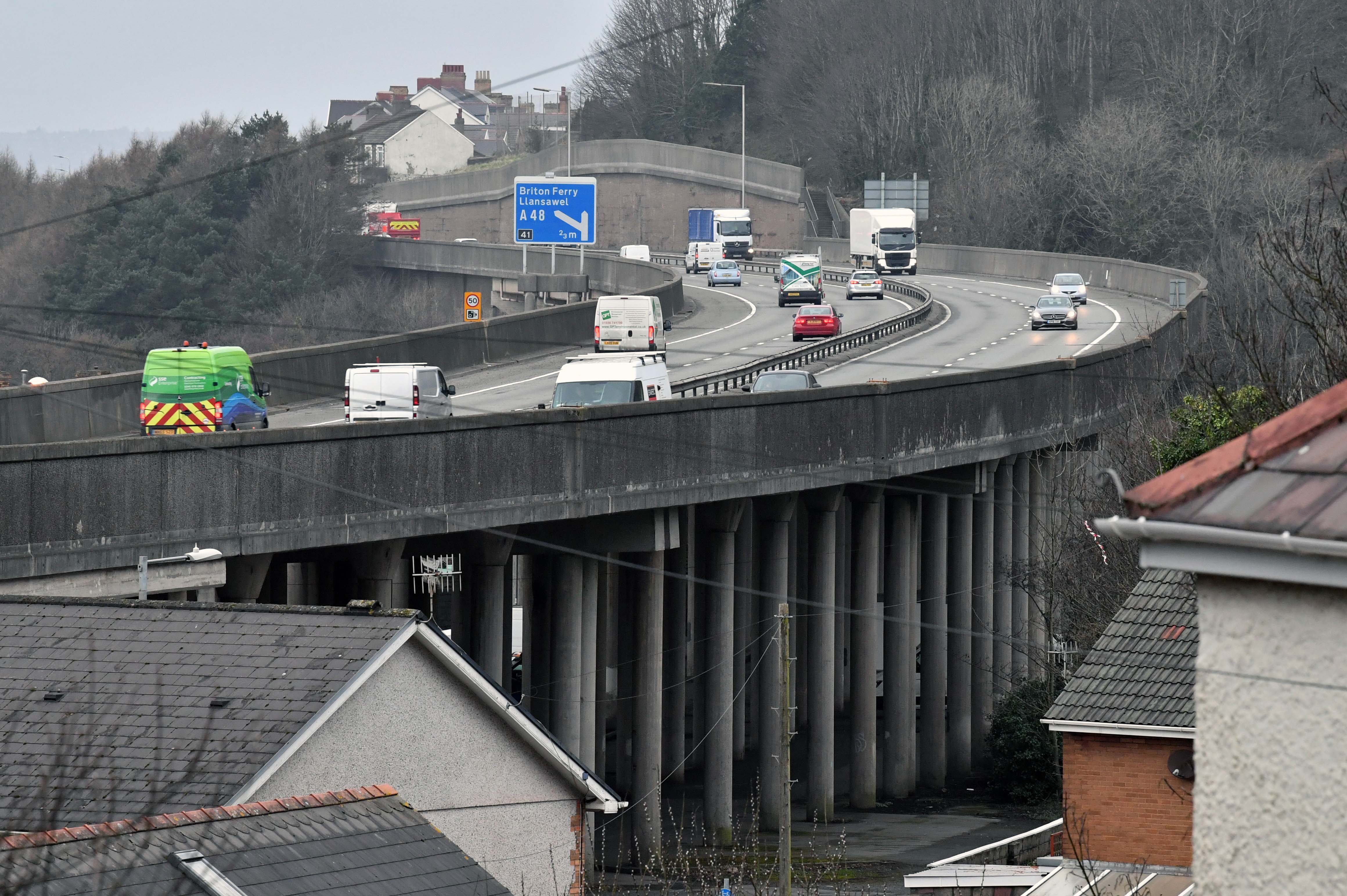 Large parts of M4 bridge falling off and landing close to people s