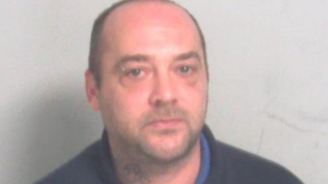 Liam Middle, 40, threatened the woman with a sledgehammer