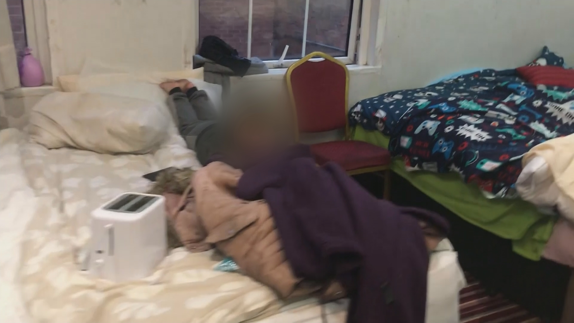 Mother Of Eight Forced To Live In Cramped Hotel Room During Lockdown As