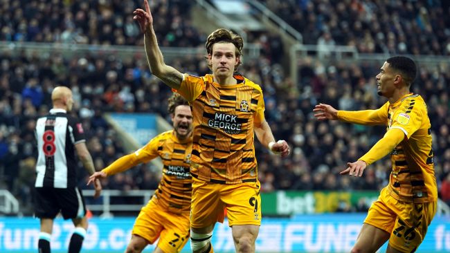 Cambridge United's Joe Ironside (centre) celebrates scoring their side's first goal of the game with team-mates during the Emirates FA Cup third round match at St. James' Park, Newcastle upon Tyne
Copyright: PA