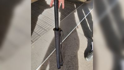 Police swooped on a train following reports a passenger had a samurai sword - but it turned out to be an umbrella.