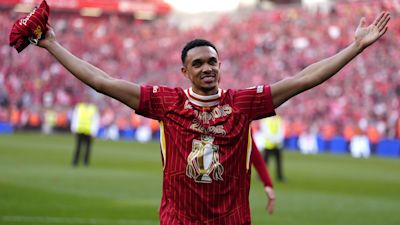 Trent Alexander-Arnold celebrate victory and the Premier League title following the Premier League match at Anfield