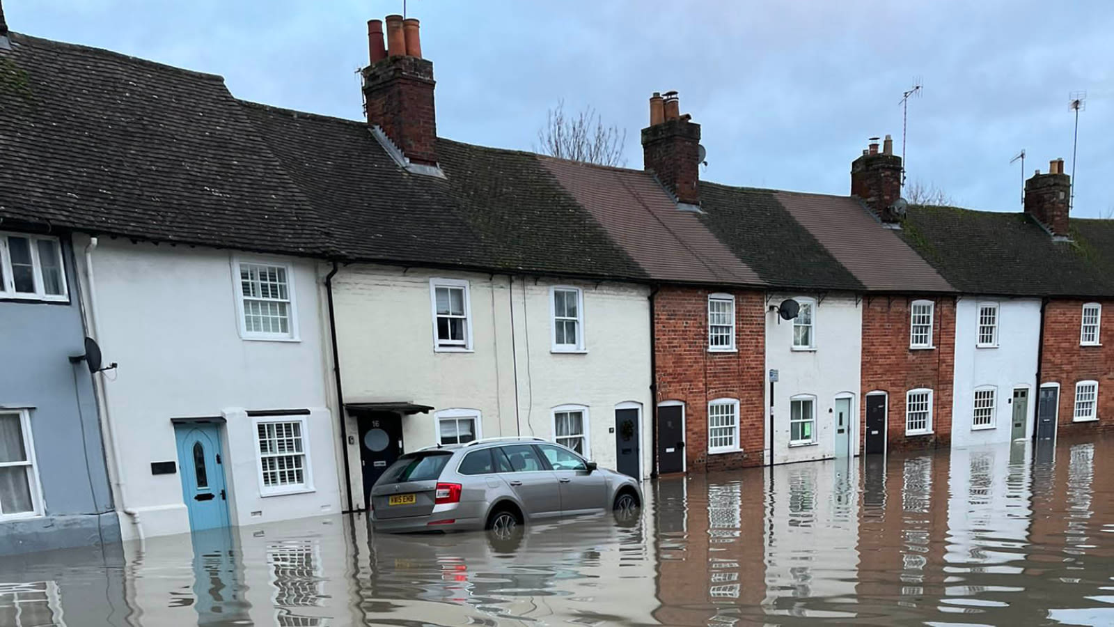 Hundreds of homes flooded as cold weather alert issued for most ...