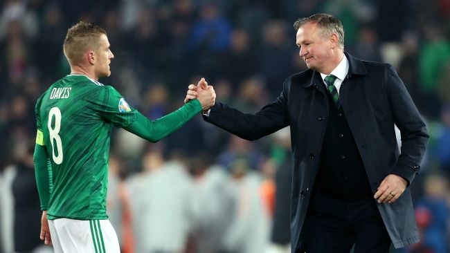 16 11 2019: Northern Ireland's Steven Davis greets manager Michael O'Neill after the final whistle during the UEFA Euro 2020 Qualifying match at Windsor Park, Belfast. (Credit: Liam McBurney/PA Wire/PA Images)