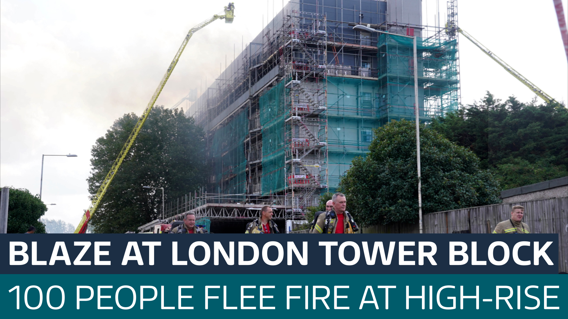 Two people taken to hospital after fire at block of flats in east ...