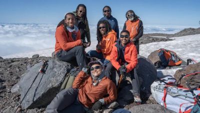 The first all-Black Mount Everest expedition team, Full Circle Everest, has reached the summit of the highest mountain on Earth, and their excitement can be felt from thousands of feet below.