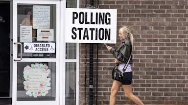 How could a summer election influence voter turnout?