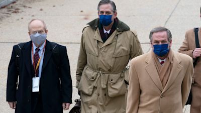 From left, David Schoen, Bruce Castor and Michael van der Veen, lawyers for former President Donald Trump, arrive at the Capitol on the third day of the second impeachment trial of Trump in the Senate, Thursday, Feb. 11, 2021, in Washington. (AP Photo/Jose Luis Magana)