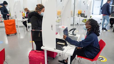 People getting tested for coronavirus at luton airport.