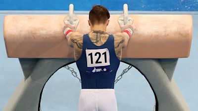 File photo dated 27-06-2019 of An Artistic Gymnast prepares to compete on the Pommel Horse.