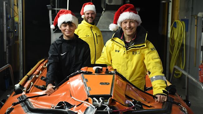 13 year-old Kaan Ozdemir returned to thank the volunteers at RNLI Wells after they saved him after he got into difficulties during a summer swim. Credit: RNLI Wells