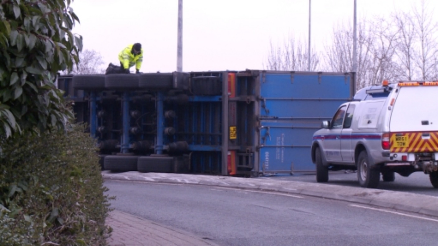 Driver taken to hospital after lorry overturns in Bristol | ITV News ...