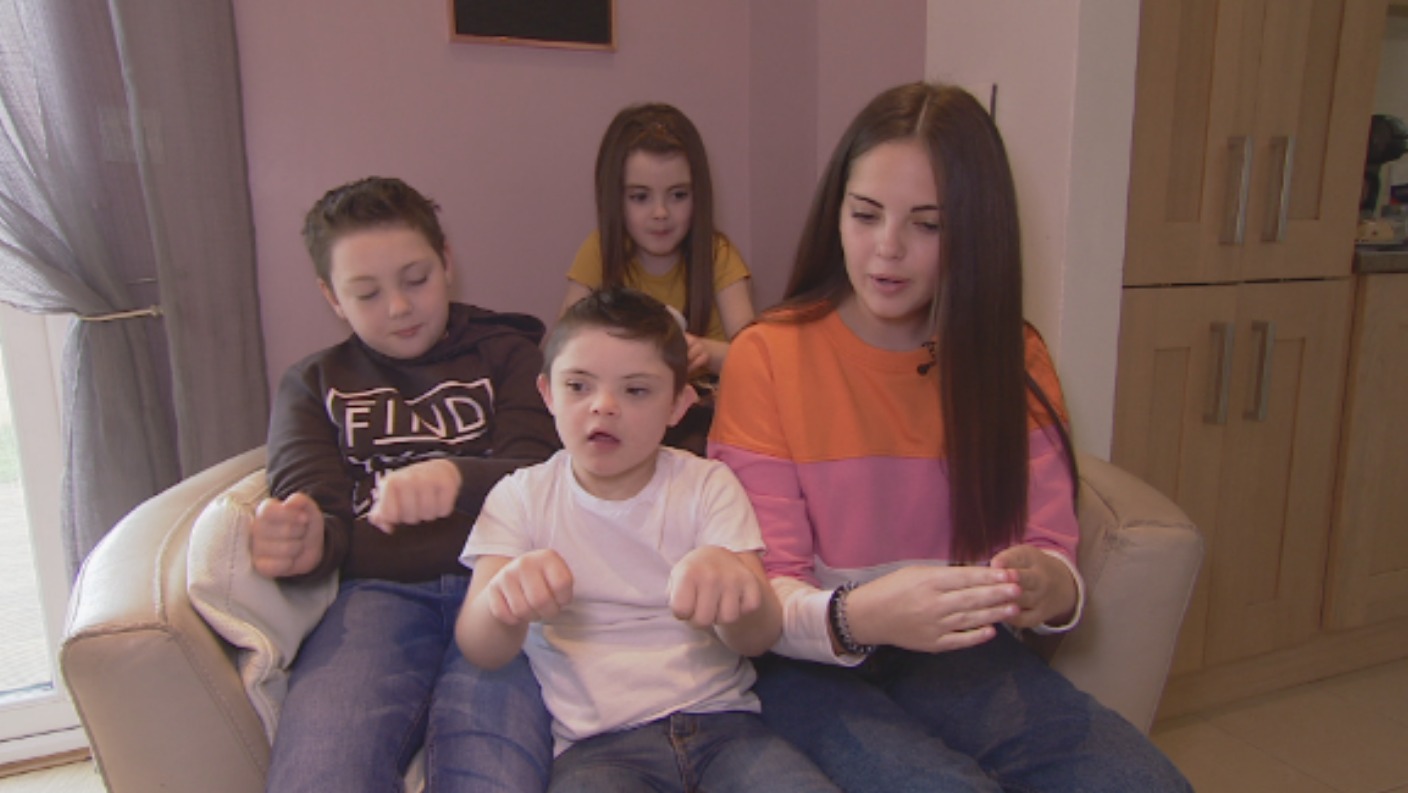 Sister learns sign language to help brother with Down's ...