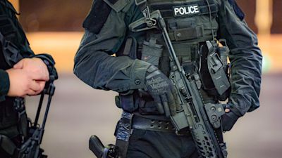 A stock image of a police firearm.