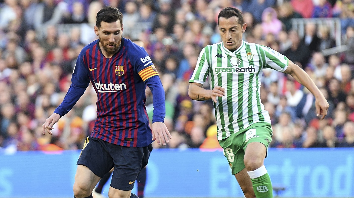 Watch Real Betis take on top of the table Barcelona in La Liga action