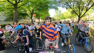 Rave reception for drum n bass DJ on a bike as he returns to