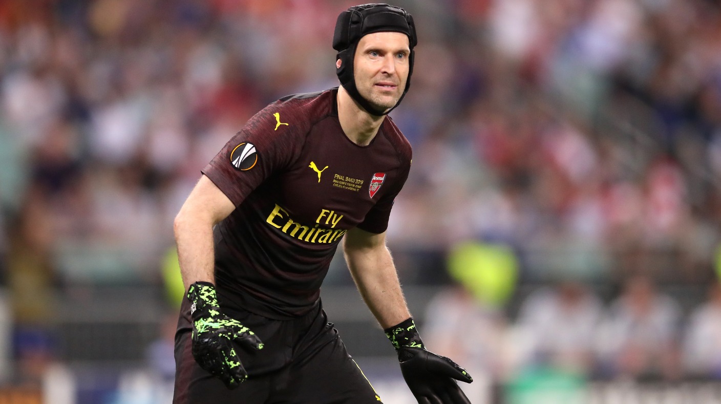 Petr Cech saves two penalties on man of the match ice hockey debut wearing  Chelsea and Arsenal badges on helmet