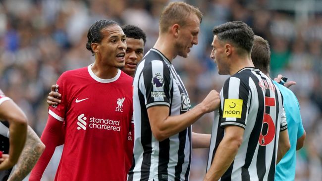 Liverpool's Virgil van Dijk (left) has an altercation with Newcastle United's Fabian Schar during the Premier League match at St. James' Park