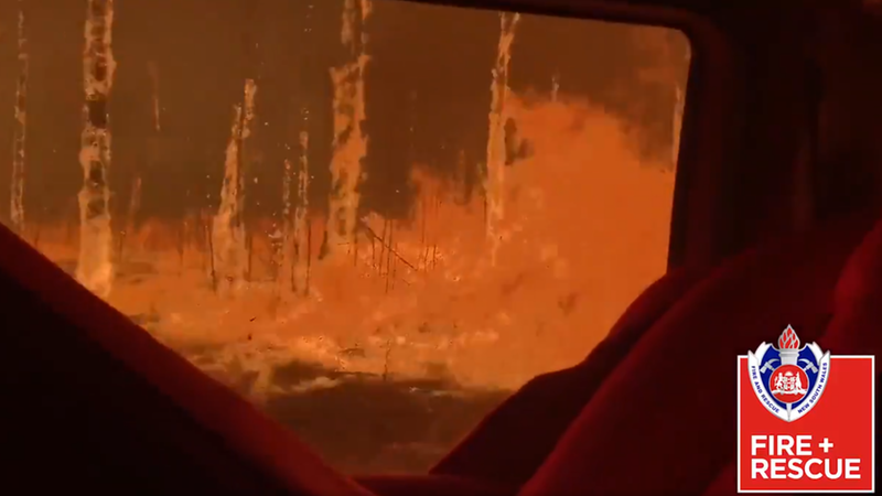 Australian firefighters film moment their truck was overrun by bush ...
