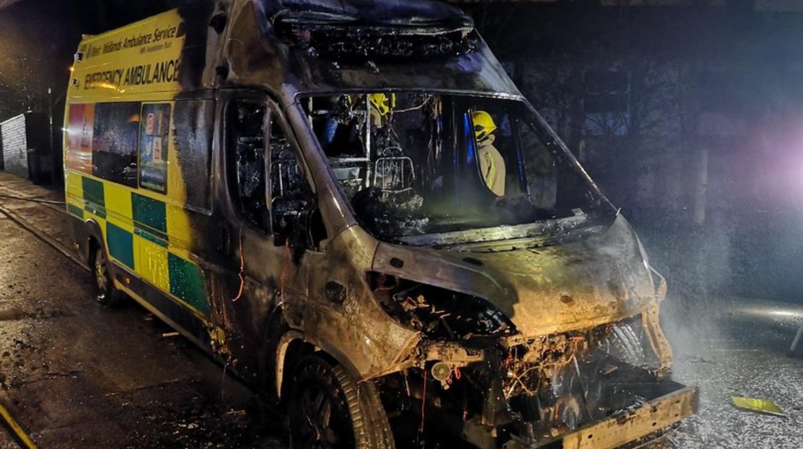 Ambulance goes up in flames as paramedics treat patient in